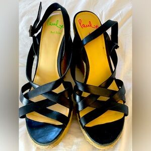 Pair of Paul Smith wedge sandals in black. Size 39